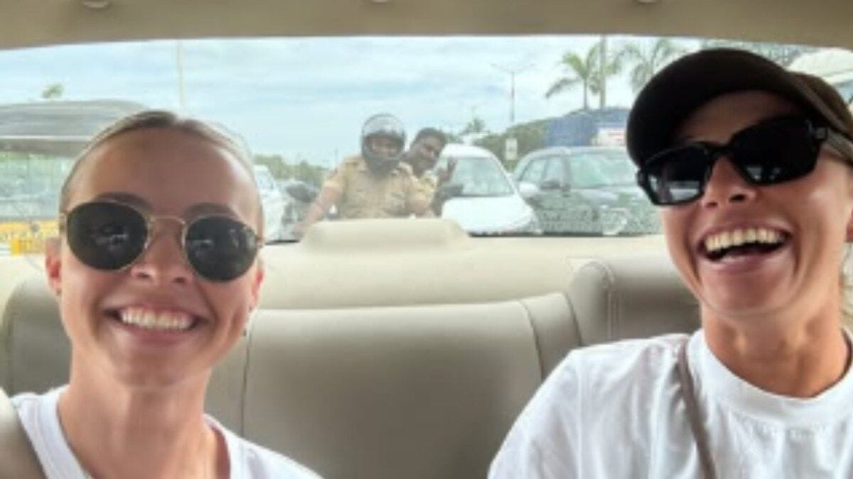 Police escort accompanying Australia women’s cricket team and family for safety in India after Indore molestation incident during Women’s World Cup 2025.