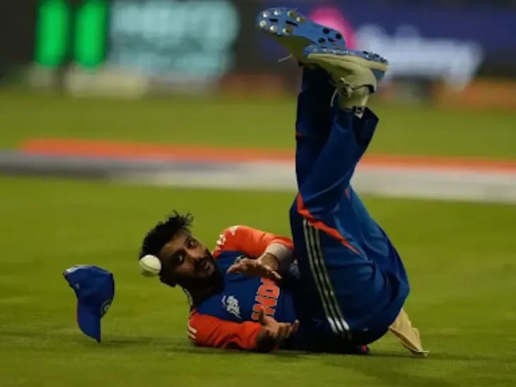 Axar Patel suffers head hit vs Oman; a doubt for Pakistan Super Four game Axar Patel falling on the ground with impact on head while trying to attempt a catch in a match against Oman in Asia Cup