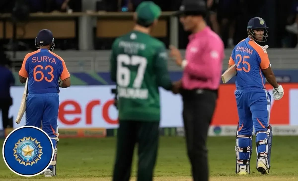 Indian players walks off the field after winning the match skipping handshake,BCCI logo on the left.