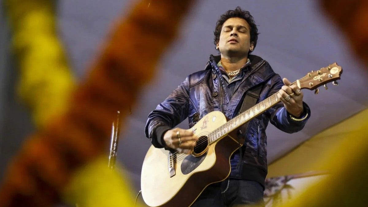 Zubeen Garg singing during a concert.