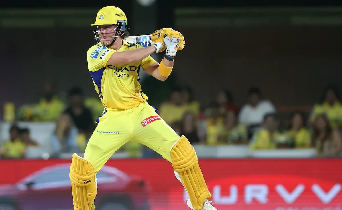 Dewald Brevis in CSK jersey playing a shot during an IPL match.