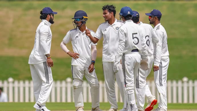 Duleep Trophy Final: Central Zone make four changes for South Zone clash Players discussing during a domestice match and are visible in white colours jersey.