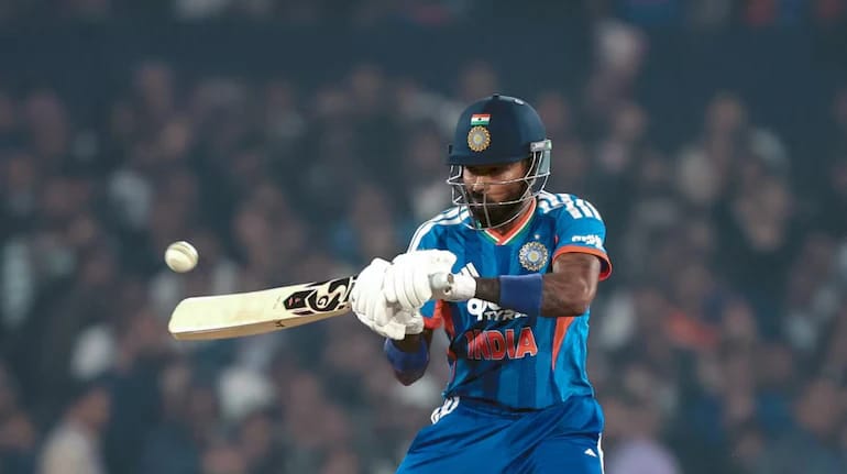 Hardik Pandya running in to bowl with the new ball as India T20I captain Suryakumar Yadav watches on, reflecting his evolving bowling role before the 2026 T20 World Cup