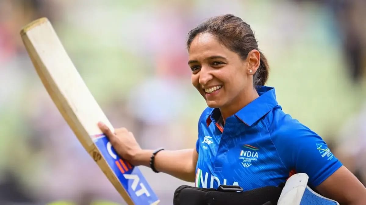 Harmanpreet Kaur Backs India To Meet Australia Head‑On Before Women’s ODI World Cup Harmanpreet Kaur smiles during a match, bat in hand, Harmanpreet to play a big role as India prepare for the Australia ODI series before the home World Cup.