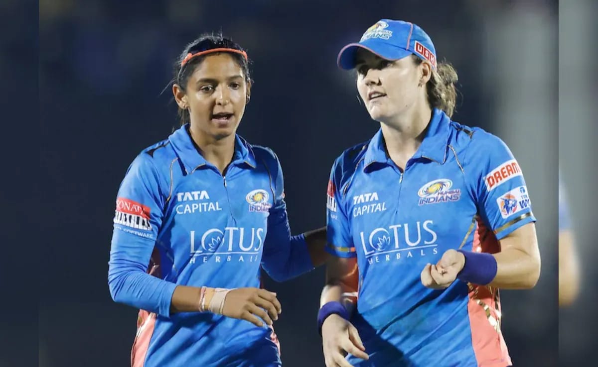 Harmanpreet Kaur and Nat Sciver-Brunt celebrating Mumbai Indians WPL 2025 title, with captain's decision to retain England all-rounder as top pick (Rs 3.5 crore) ahead of herself (Rs 2.5 crore) demonstrating team-first leadership philosophy.