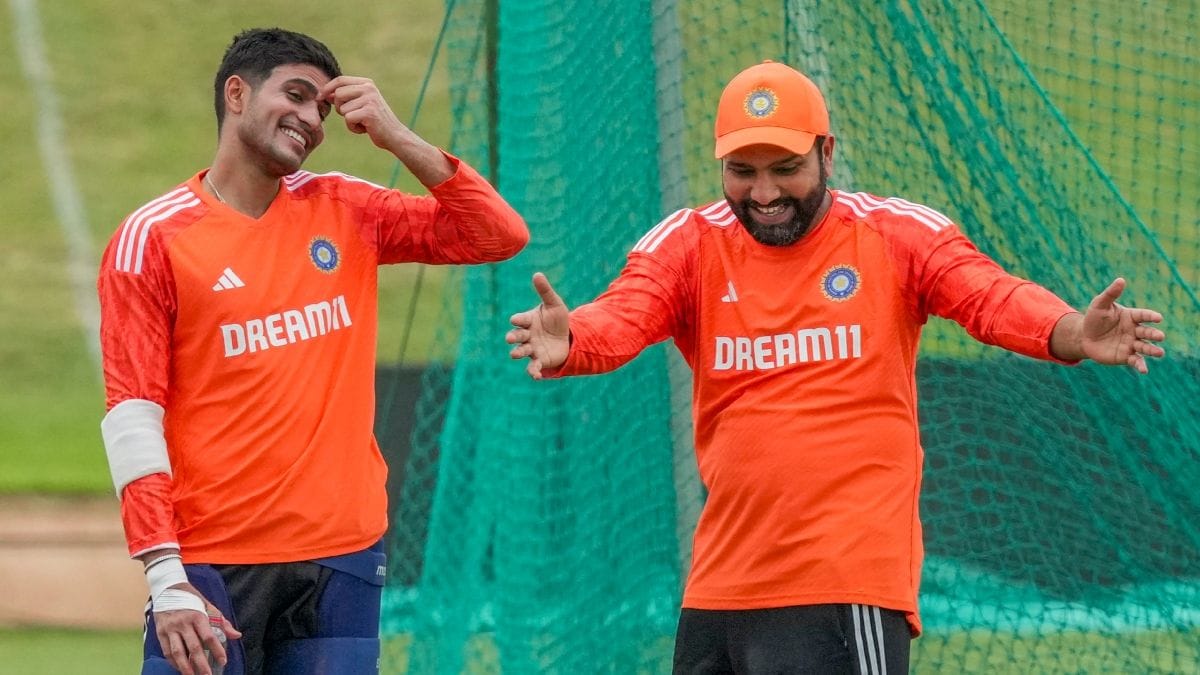A New ODI Leader On The Horizon? Why All Signs Point To A Change Shubman Gill and Rohit Sharma sharing a light moment during practice session in India's orange practice jersey