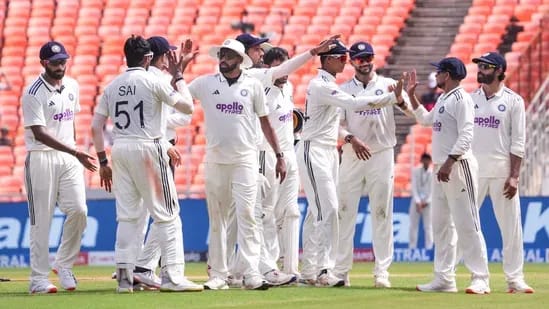 India team at Ahmedabad after an overnight declaration, plotting a morning new‑ball assault that set up an innings win against West Indies.