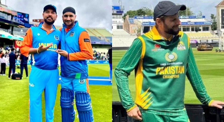 Yuvraj Singh and Harbhajan Singh posing for a photo while Saheed Afridi thinking near boundary line.