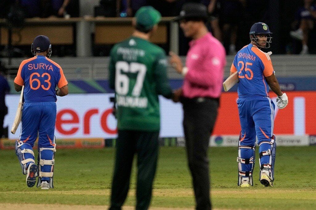PCB protests ‘no handshake’ after India win; India says it was a tribute to Pahalgam victims Pakistan player talking to umpire while Indian batter leave the field after the match, with no post-game handshake.
