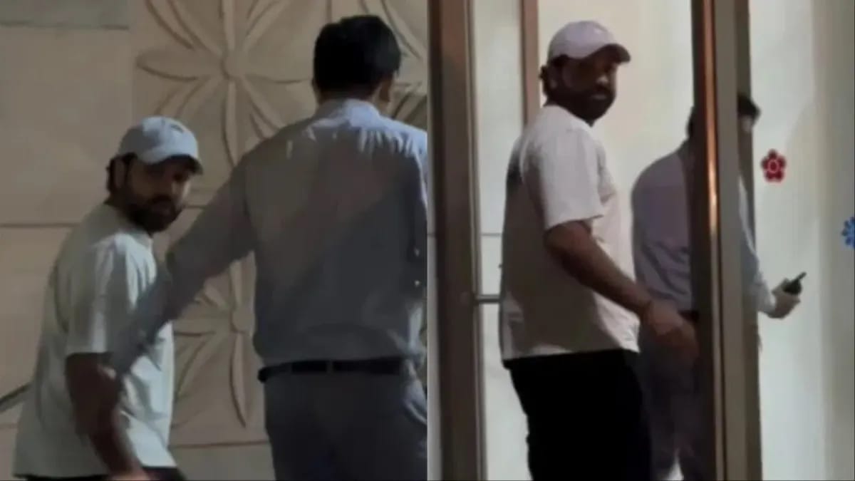Rohit Sharma’s Late‑Night Hospital Visit Sparks Concern: What We Know? Rohit Sharma walks into a Mumbai hospital entrance at night, wearing casuals and a cap.