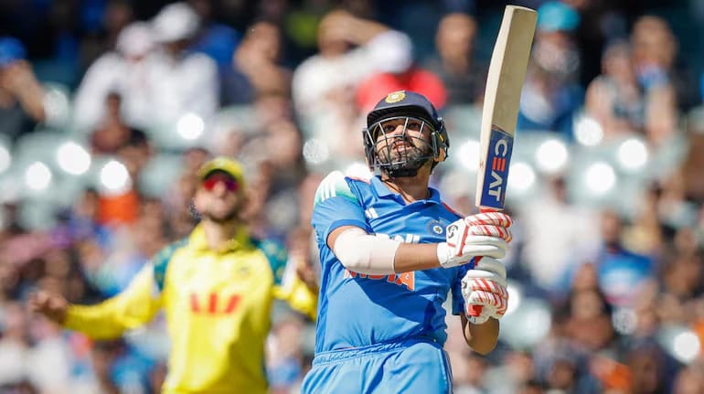 Rohit Sharma playing a measured innings of 73 runs during the Adelaide ODI, demonstrating resilience and confidence after a poor Perth performance.