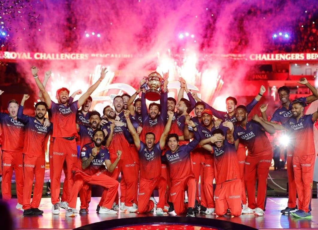 Royal Challengers Bengaluru IPL team celebrating their 2025 championship victory as franchise ownership put up for sale by Diageo with March 2026 deadline