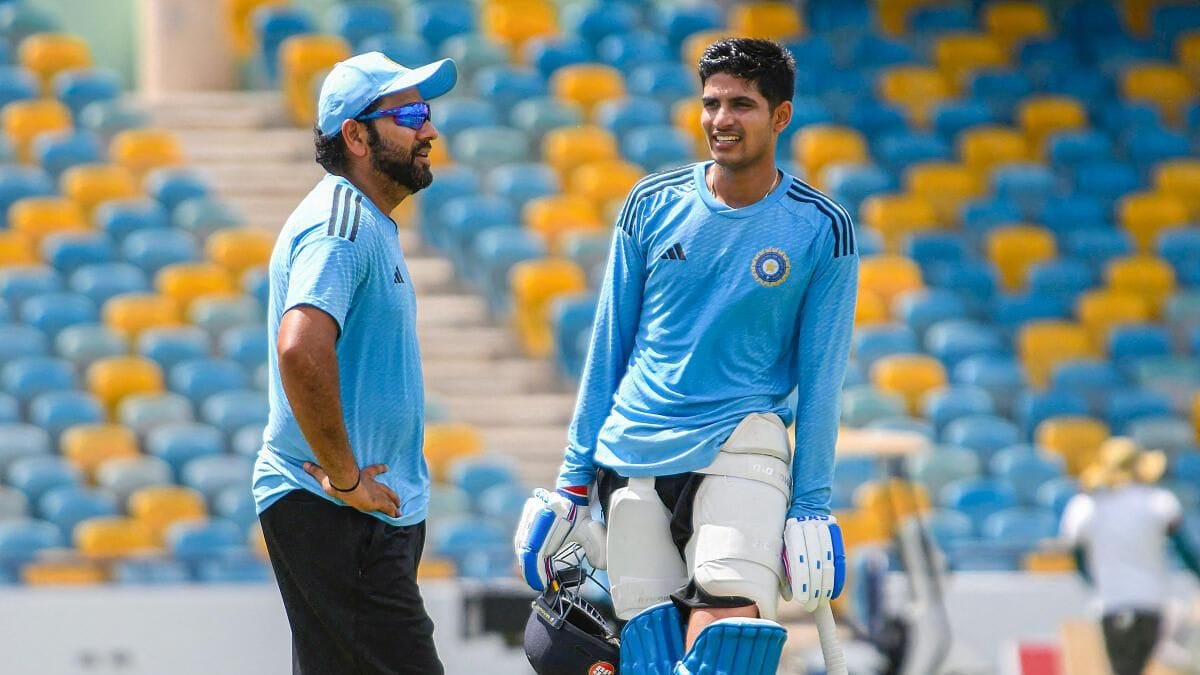 Shubman Gill and Rohit Sharma chatting during a practoce session earlier.