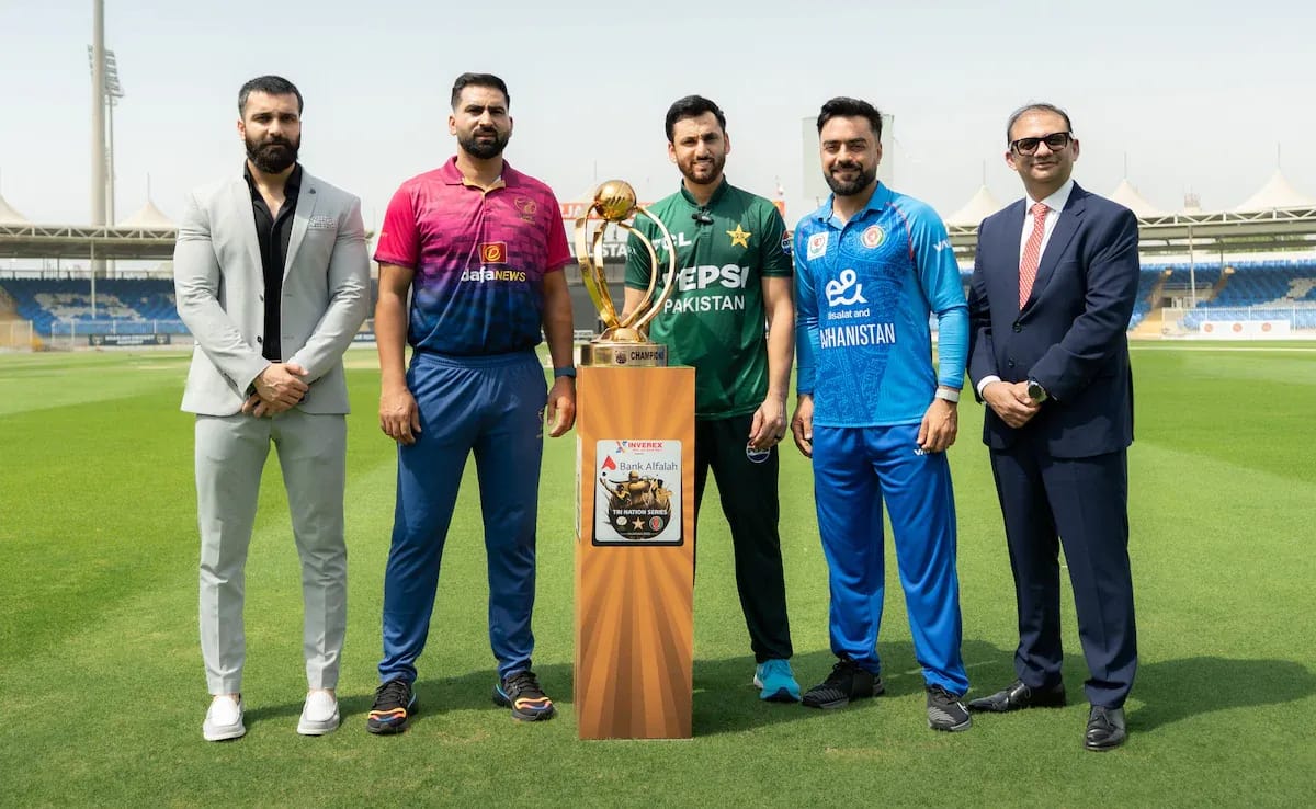 T20I Tri-Series In UAE: Pakistan, Afghanistan Prepares for Asia Cup Captains of Pakistan, Afghanistan, and UAE pose at Sharjah Stadium before the T20I Tri-Series