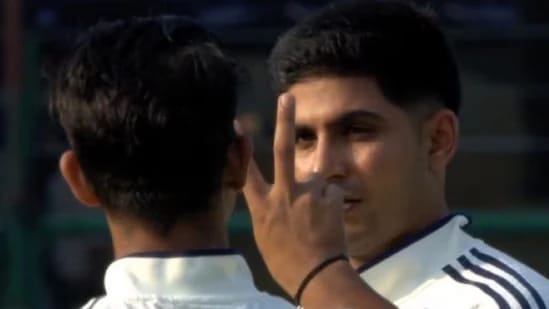  Yashasvi Jaiswal performing concussion test on captain Shubman Gill after collision with West Indies wicketkeeper Tevin Imlach during Day 1 of India vs West Indies 2nd Test in Delhi, where Jaiswal scored unbeaten 173 to put India at commanding 318/2.